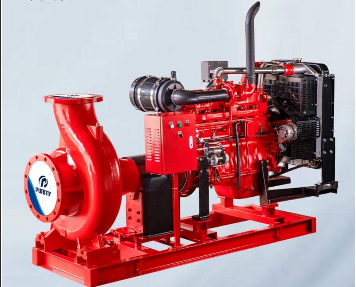 Diesel engine driven end-suction fire pump on steel skid — shows engine block, exhaust, radiator, pump casing with flanged suction, and control panel