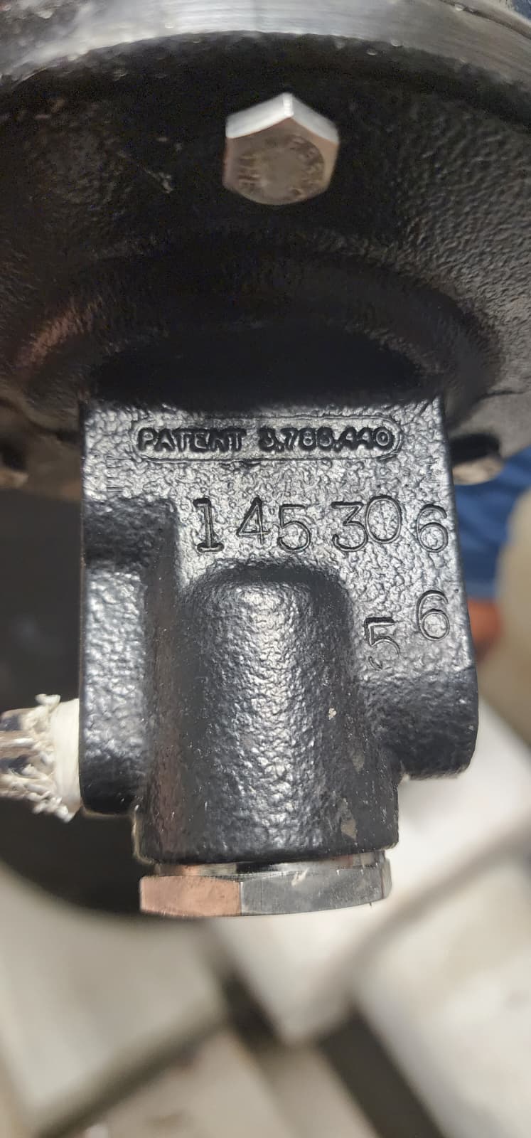 Close-up of accelerator body showing Patent 3,768,440 and serial number 145306